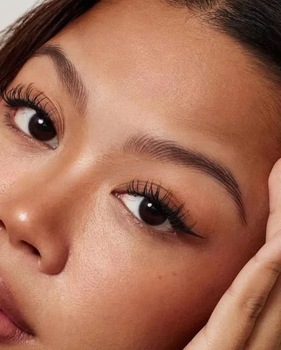 Close up of woman's eyes with defined makeup